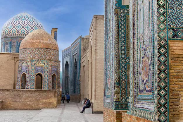 The tiled mausoleum facades of the Shah-i-Zinda necropolis in Samarkand, Uzbekistan