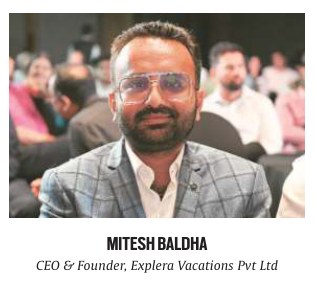 Mitesh Baldha, CEO and Founder of Explera Vacations Pvt Ltd, in the guest gallery of The Indian Express Adda coverage